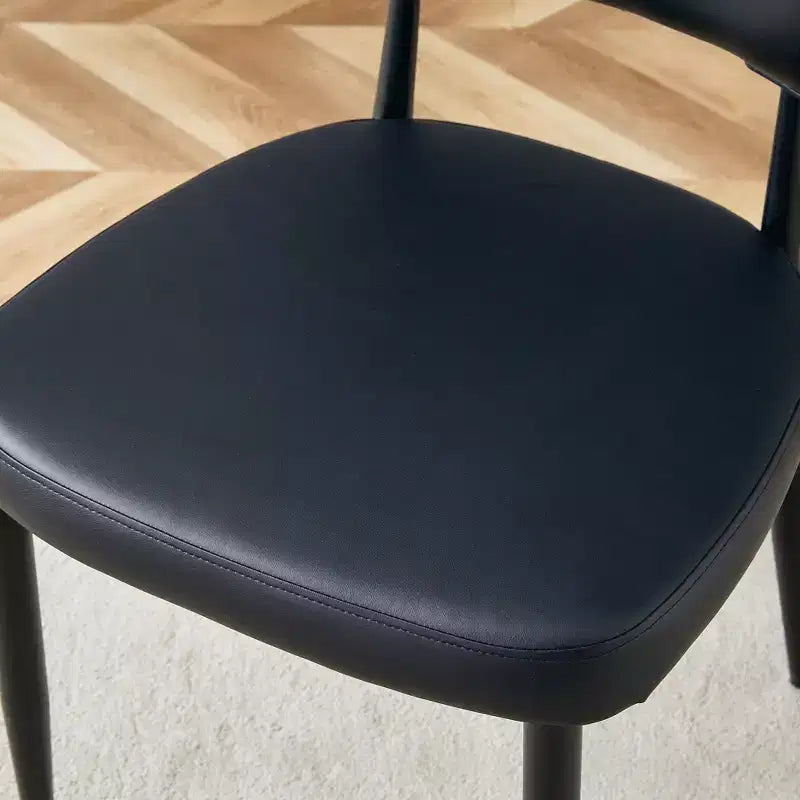 Lot de 4 Chaises de Salle à Manger Noires Minimalistes et Ergonomiques avec Dossier Courbé – Assise en PU