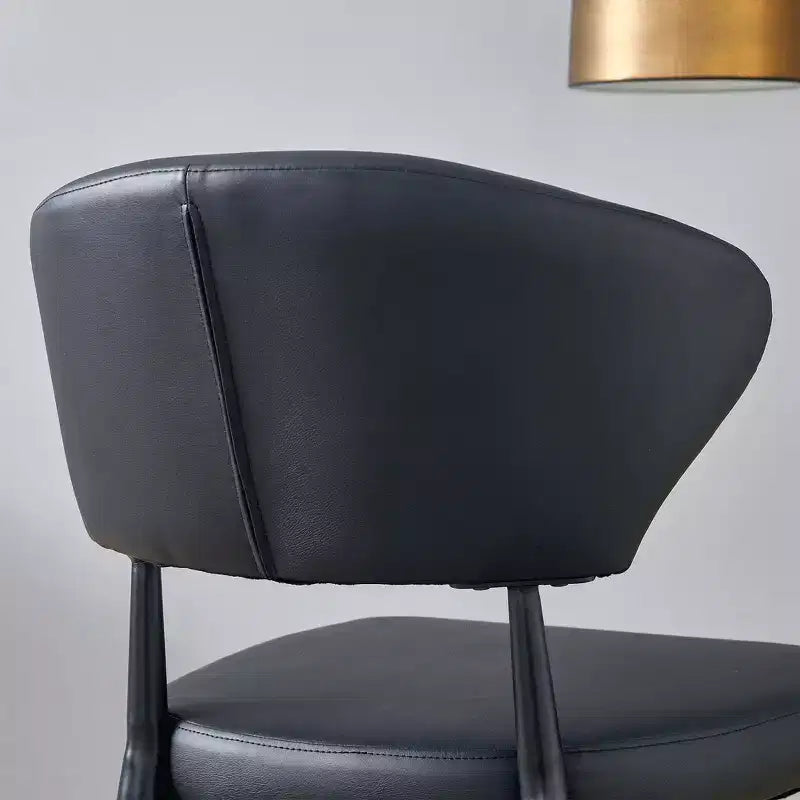 Lot de 4 Chaises de Salle à Manger Noires Minimalistes et Ergonomiques avec Dossier Courbé – Assise en PU
