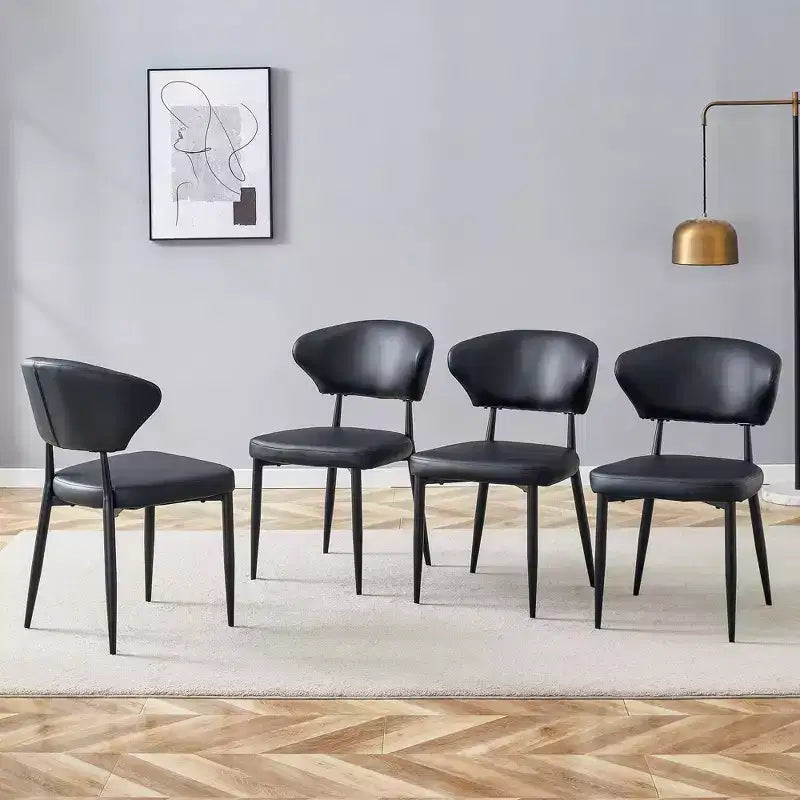 Lot de 4 Chaises de Salle à Manger Noires Minimalistes et Ergonomiques avec Dossier Courbé – Assise en PU
